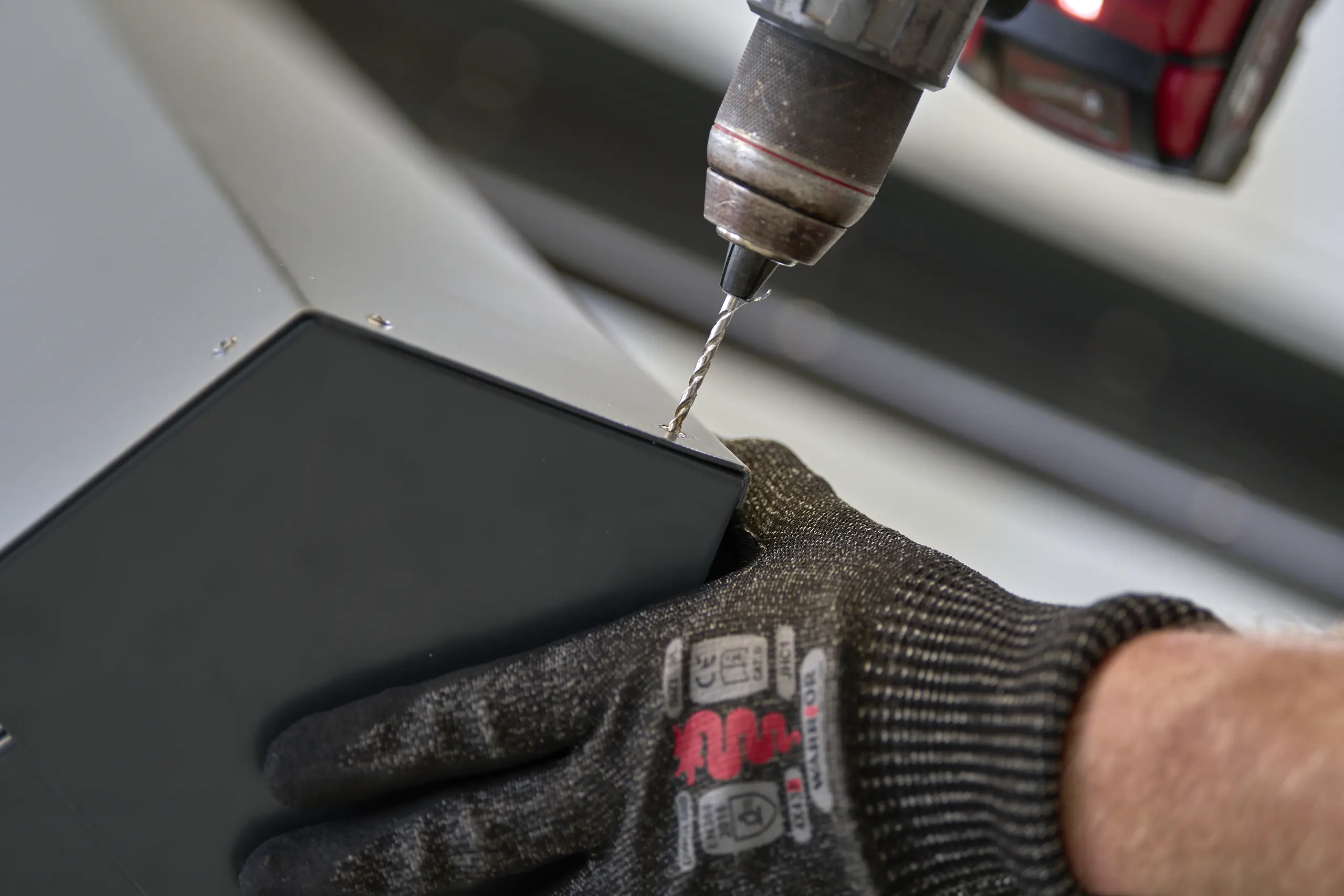 Detail drilling - Close-up of precision drilling into fabricated aluminium sections.