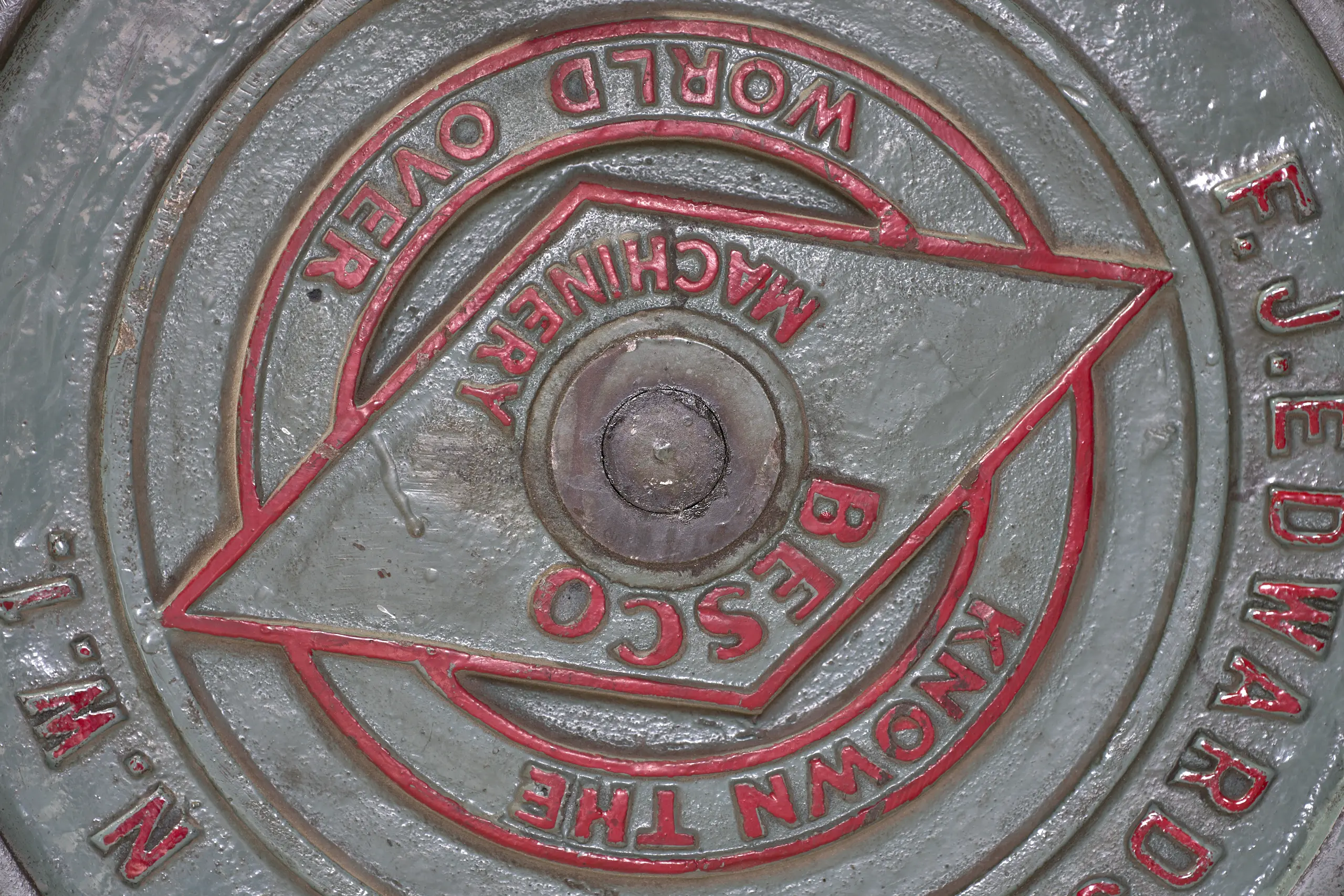 Heritage factory detail - Machinery badge reflecting decades of industrial heritage.