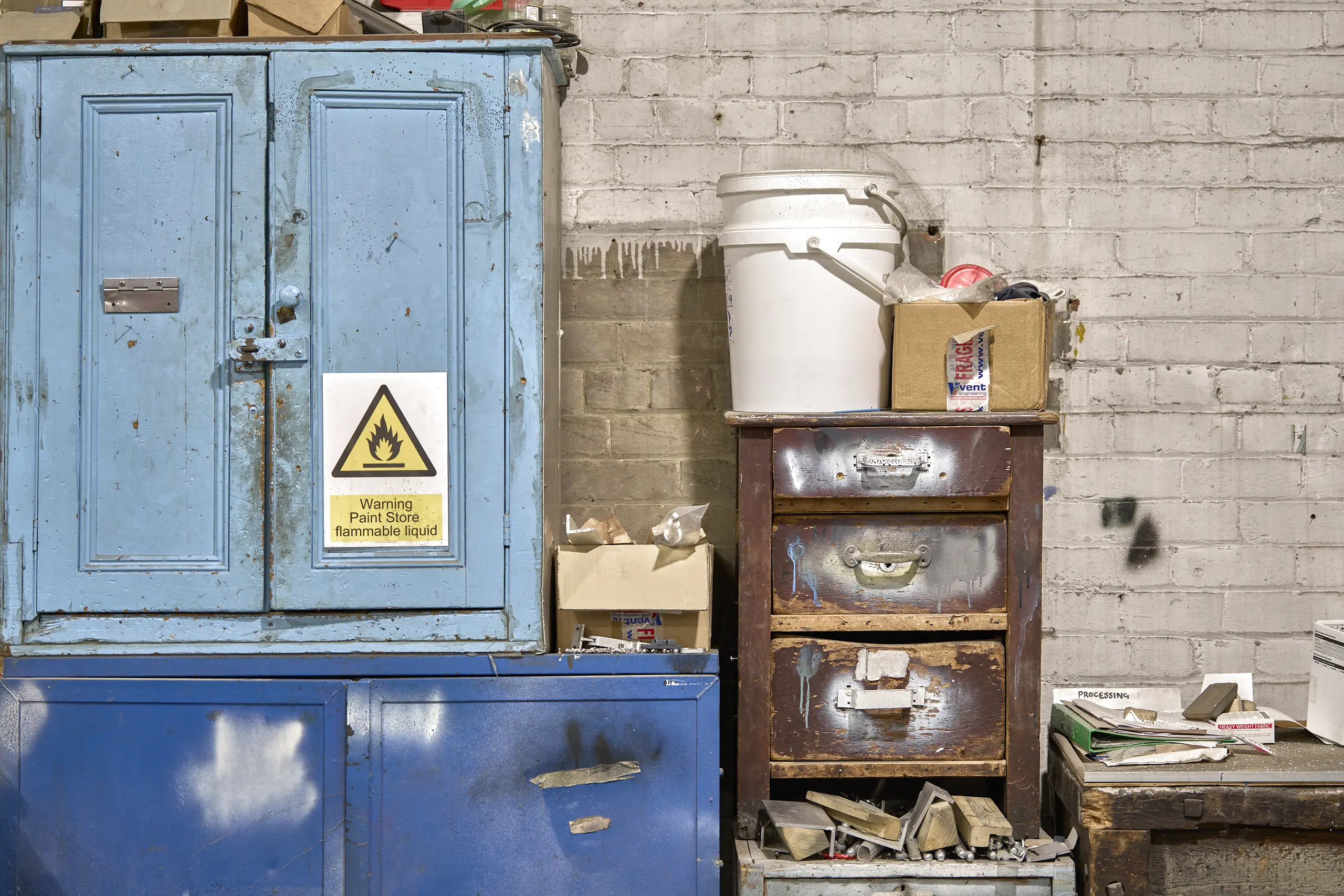 Workshop environment - Heritage storage cabinets and materials within the working factory space.